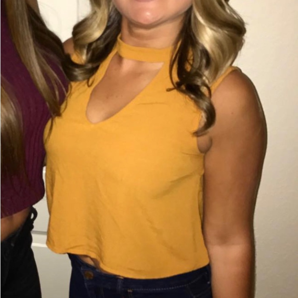Size small mustard yellow crop top with cut out
